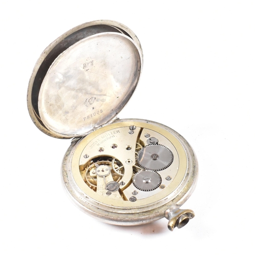 294 - A Josef Muller of Munchen railway timepiece pocket watch. Silver 800 stamped case with monogram cart... 