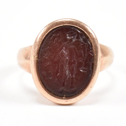 30 - A Victorian hallmarked 9ct gold ring set with carnelian intaglio seal depicting a warrior, possibly ... 