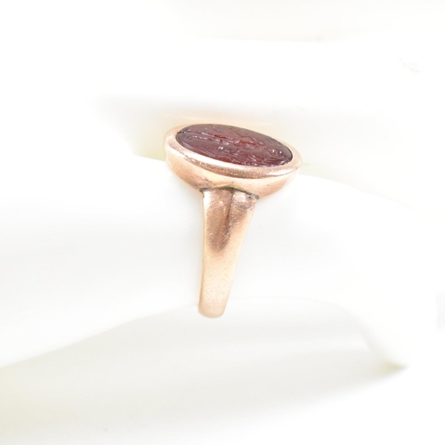 30 - A Victorian hallmarked 9ct gold ring set with carnelian intaglio seal depicting a warrior, possibly ... 