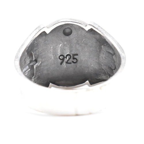 315 - A contemporary 925 silver masonic style ring. Weight approx 7.6g. Size approx X-W. All weights, meas... 