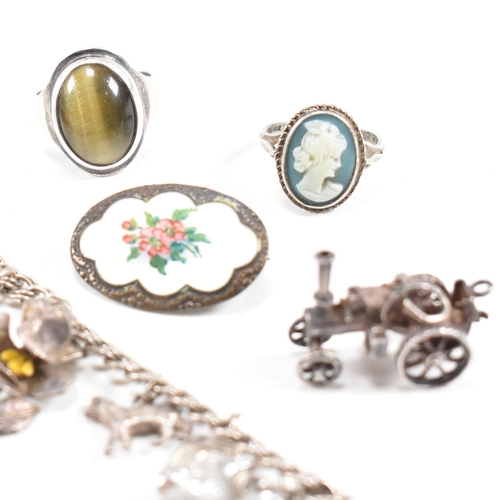 326 - A collection of silver and white metal jewellery. The jewellery to include a hallmarked silver tiger... 