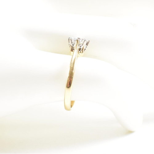 34 - A hallmarked 18ct gold and diamond solitaire ring. The ring hallmarked Birmingham. Estimated diamond... 