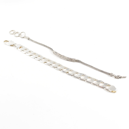 345 - Two 925 silver bracelets. A chunky curb link chain with a lobster claw clasp marked 925, 25cm.  A pa... 