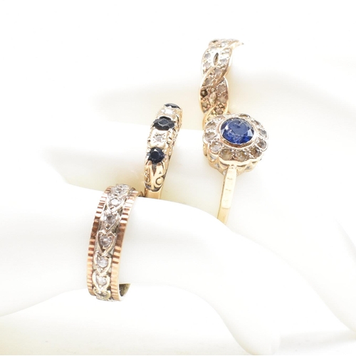 353 - Four hallmarked 9ct gold gem set rings. The rings to include a white stone eternity ring, a hallmark... 