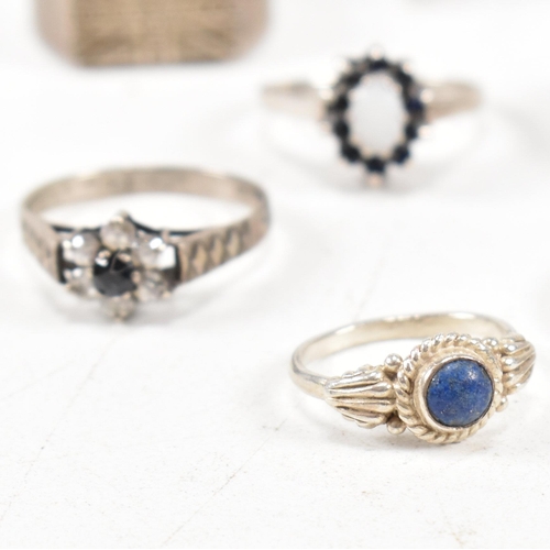 354 - A collection of 925 silver and gem set rings.The rings to include sapphire, lapis lazuli, marcasite,... 