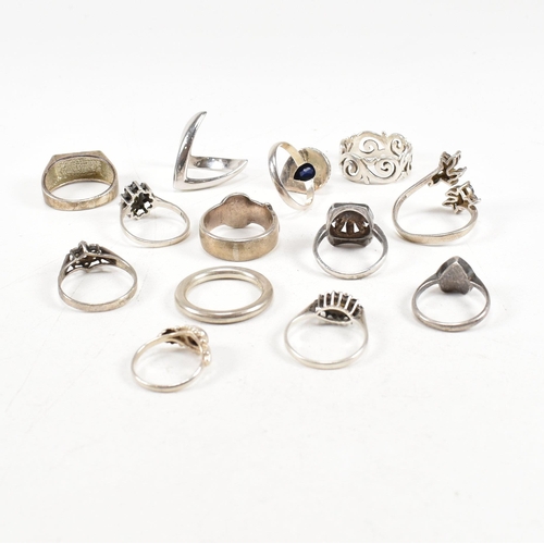 354 - A collection of 925 silver and gem set rings.The rings to include sapphire, lapis lazuli, marcasite,... 