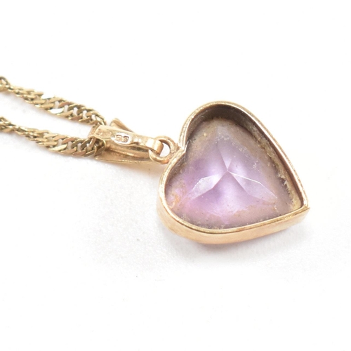 361 - A hallmarked 9ct gold pendant necklace. The necklace strung with an amethyst heart pendant on a fine... 