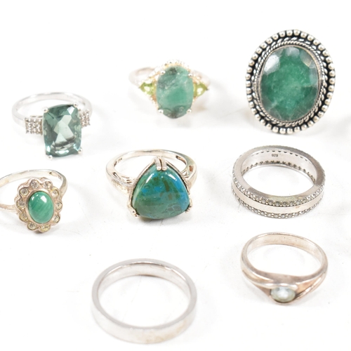 363 - A collection of 925 silver and gem set rings. The rings to include malachite, emerald, paste, CZ, Pe... 