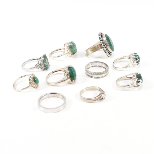 363 - A collection of 925 silver and gem set rings. The rings to include malachite, emerald, paste, CZ, Pe... 