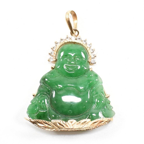 370 - An gold mounted jade happy Buddha pendant.  Marks worn tests indicate 18ct gold. Weight 9.2g. Measur... 