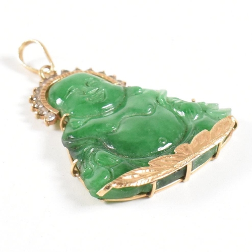 370 - An gold mounted jade happy Buddha pendant.  Marks worn tests indicate 18ct gold. Weight 9.2g. Measur... 