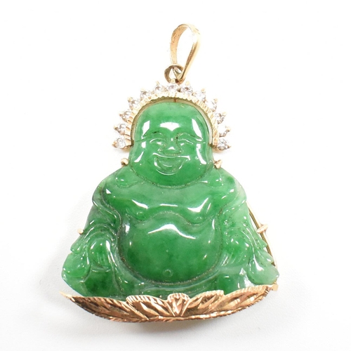 370 - An gold mounted jade happy Buddha pendant.  Marks worn tests indicate 18ct gold. Weight 9.2g. Measur... 