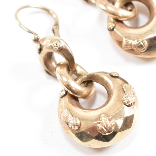 373 - A pair of 19th century pendant earrings. The earrings formed with three graduated hoops with partial... 