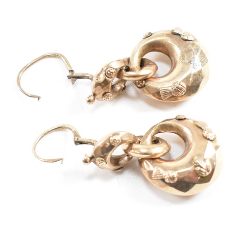 373 - A pair of 19th century pendant earrings. The earrings formed with three graduated hoops with partial... 