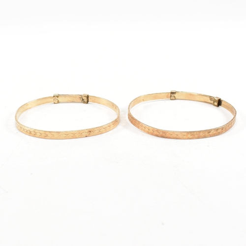 378 - Four vintage 9ct rolled gold and metal core bangles. Including one branded Excalibur  1/20th 12ct  r... 