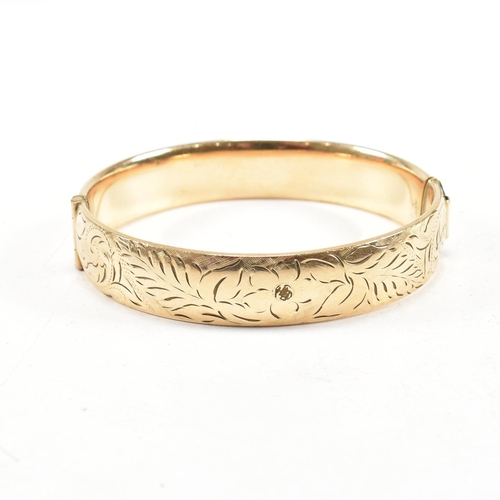 378 - Four vintage 9ct rolled gold and metal core bangles. Including one branded Excalibur  1/20th 12ct  r... 