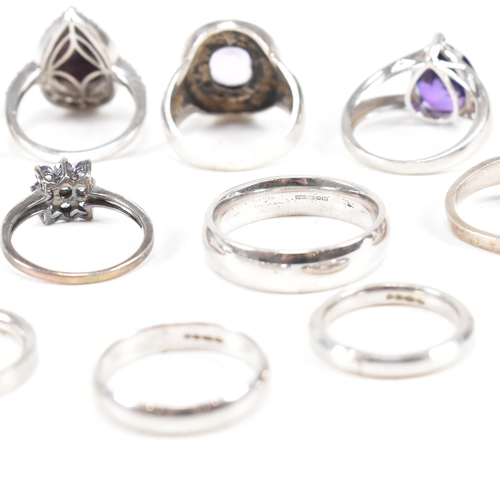 382 - A collection of 925 silver and gem set rings.The rings to include amethyst quartz, CZ, marcasite ban... 