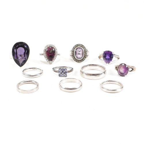 382 - A collection of 925 silver and gem set rings.The rings to include amethyst quartz, CZ, marcasite ban... 