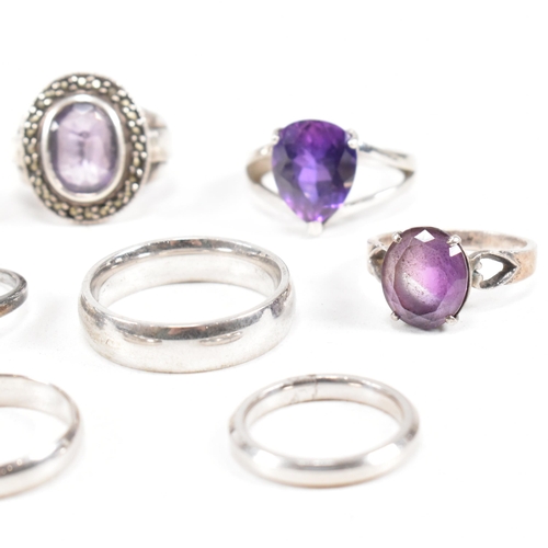 382 - A collection of 925 silver and gem set rings.The rings to include amethyst quartz, CZ, marcasite ban... 