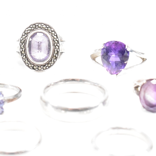 382 - A collection of 925 silver and gem set rings.The rings to include amethyst quartz, CZ, marcasite ban... 