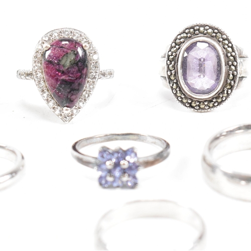 382 - A collection of 925 silver and gem set rings.The rings to include amethyst quartz, CZ, marcasite ban... 