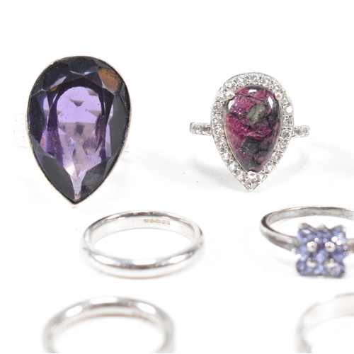 382 - A collection of 925 silver and gem set rings.The rings to include amethyst quartz, CZ, marcasite ban... 