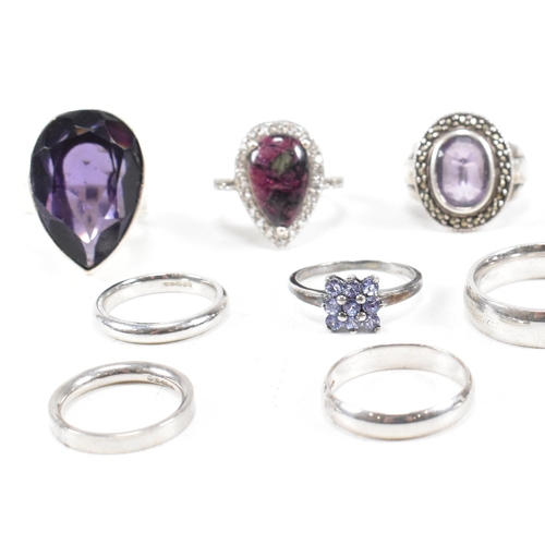 382 - A collection of 925 silver and gem set rings.The rings to include amethyst quartz, CZ, marcasite ban... 