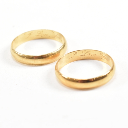 385 - A pair of hallmarked 18 ct gold band rings. The ring hallmarked Birmingham. Inscribed i Love You. We... 