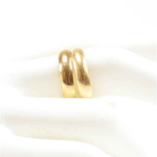 385 - A pair of hallmarked 18 ct gold band rings. The ring hallmarked Birmingham. Inscribed i Love You. We... 