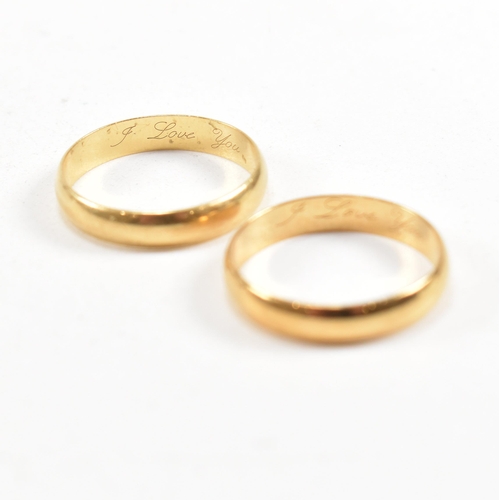 385 - A pair of hallmarked 18 ct gold band rings. The ring hallmarked Birmingham. Inscribed i Love You. We... 