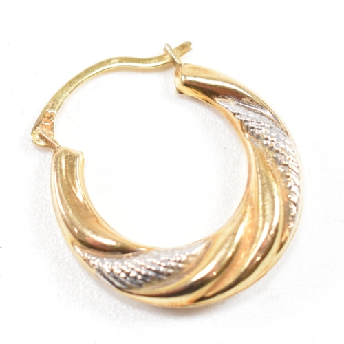 389 - Two pairs of 9ct gold earrings.  A pair of large twisted hoop earrings marked 375, 2.8cm. A pair of ... 