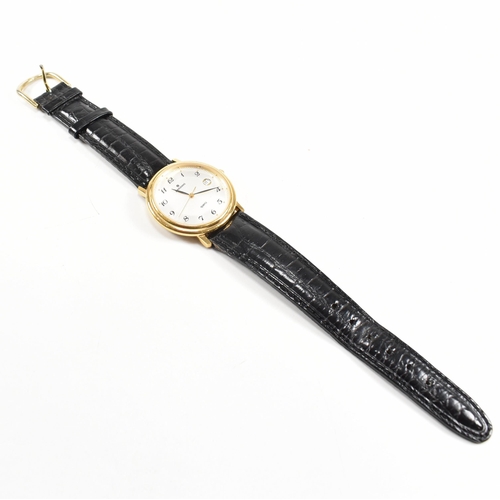 390 - A Junghans gentleman's gold plated wristwatch. Silvered dial with date aperture to 3 position. Arabi... 