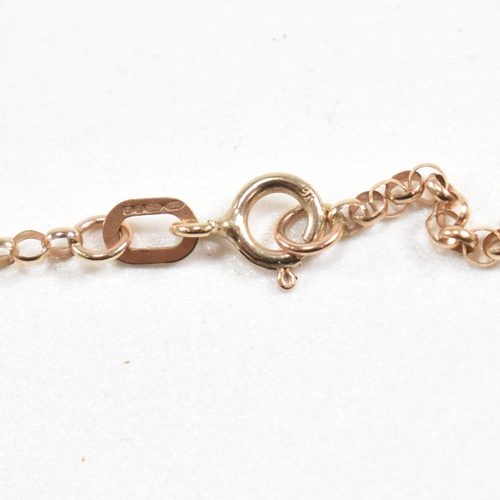 393 - A hallmarked 9ct gold chain and two pendants. The chain hallmarked 9ct rose gold. The pendants inclu... 