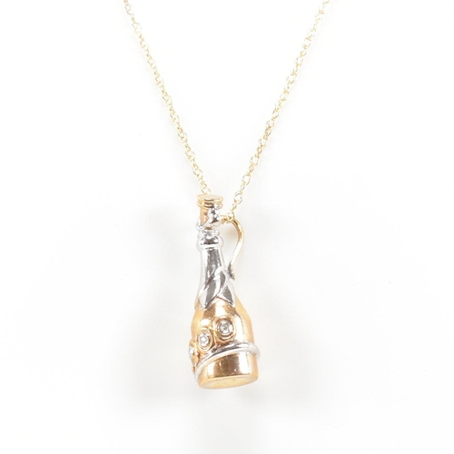 397 - A hallmarked 9ct gold and diamond millennium pendant necklace. The necklace strung with a diamond se... 