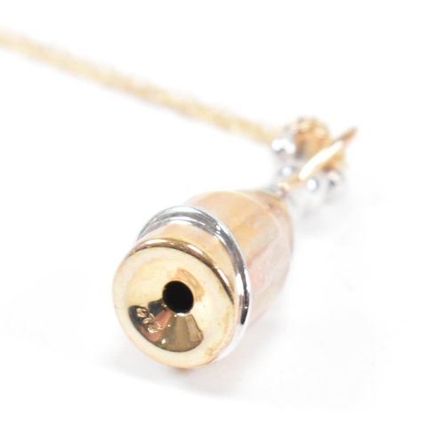 397 - A hallmarked 9ct gold and diamond millennium pendant necklace. The necklace strung with a diamond se... 