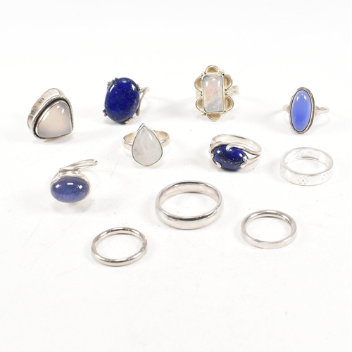 401 - A collection of 925 silver and gem set rings.The rings to include moonstone, lapis lazuli, band, cro... 