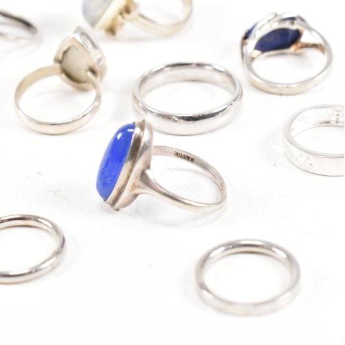 401 - A collection of 925 silver and gem set rings.The rings to include moonstone, lapis lazuli, band, cro... 