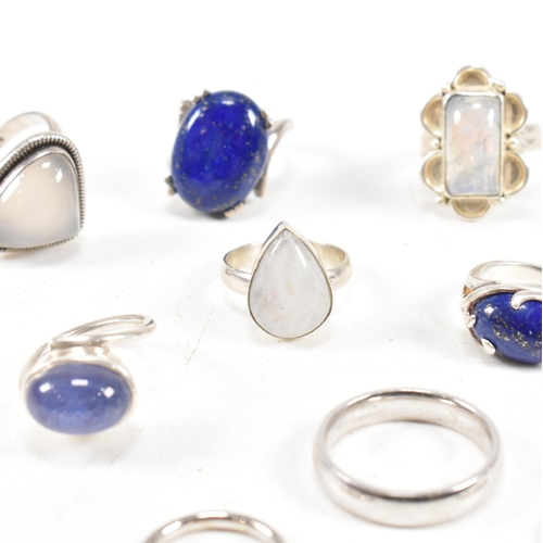 401 - A collection of 925 silver and gem set rings.The rings to include moonstone, lapis lazuli, band, cro... 