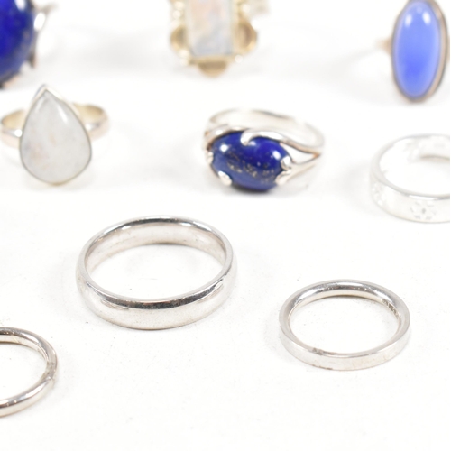 401 - A collection of 925 silver and gem set rings.The rings to include moonstone, lapis lazuli, band, cro... 