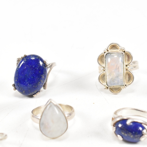 401 - A collection of 925 silver and gem set rings.The rings to include moonstone, lapis lazuli, band, cro... 