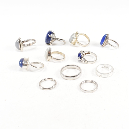 401 - A collection of 925 silver and gem set rings.The rings to include moonstone, lapis lazuli, band, cro... 