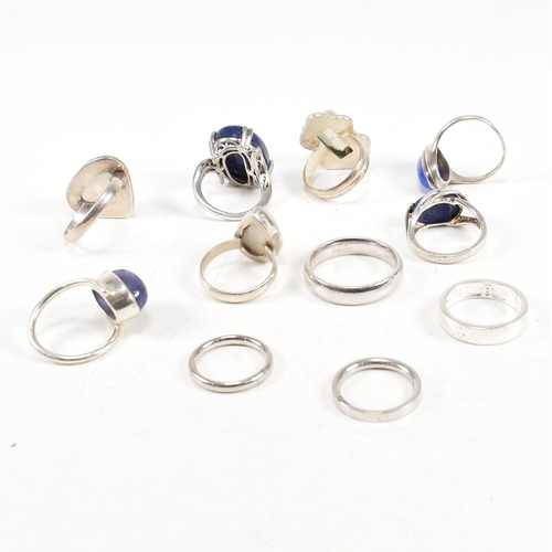 401 - A collection of 925 silver and gem set rings.The rings to include moonstone, lapis lazuli, band, cro... 