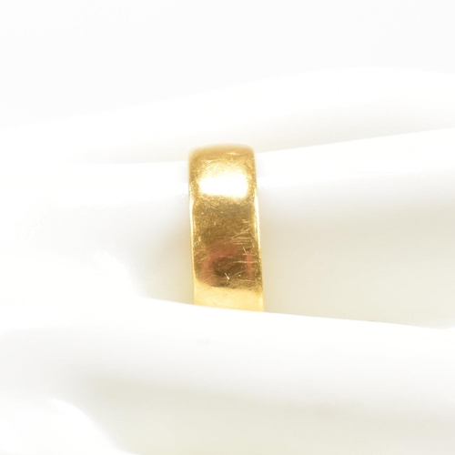 405 - A hallmarked 22ct band ring. The ring hallmarked Birmingham. Weight 5.7g. Size T. All weights, measu... 