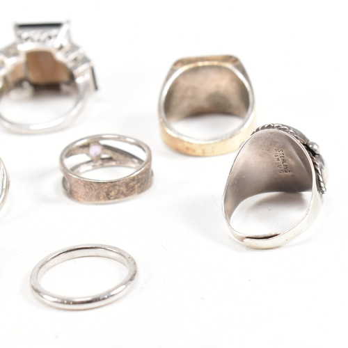 406 - A collection of 925 silver and gem set rings. The rings to include smoky quartz, hematite, paste, ba... 