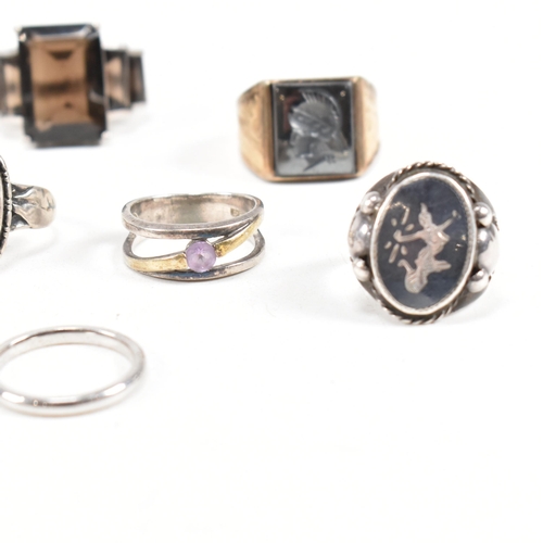 406 - A collection of 925 silver and gem set rings. The rings to include smoky quartz, hematite, paste, ba... 