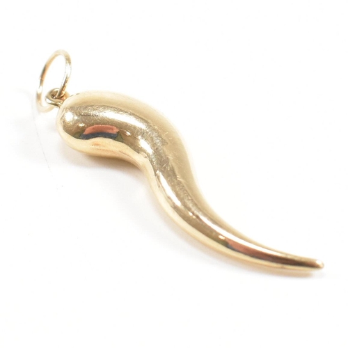 411 - A hallmarked 9ct gold horn of plenty pendant. Import mark for London to bale. Measures 4cm. Weight 1... 