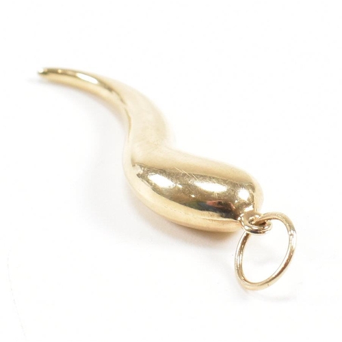 411 - A hallmarked 9ct gold horn of plenty pendant. Import mark for London to bale. Measures 4cm. Weight 1... 