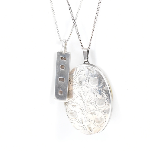 418 - A collection of five silver and pendant necklaces. The necklaces to include heart locket 2cm, oval l... 