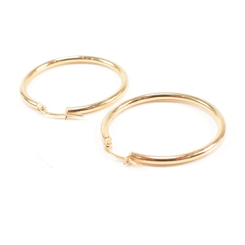 425 - Three pairs of 9ct gold earrings. The earrings to include a large pair of tube hoop earrings, 3cm, m... 