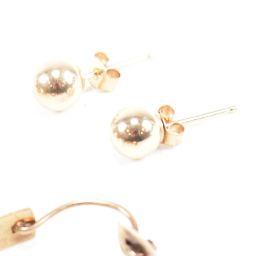 425 - Three pairs of 9ct gold earrings. The earrings to include a large pair of tube hoop earrings, 3cm, m... 